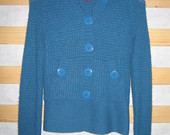 Šviesiai mėlynas megztinis 
