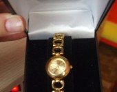 auksinis moteriskas laikrodukas