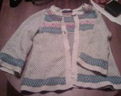 Spalvotas megztinis