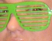 žali akiniai grotos / shutter