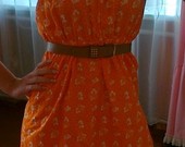 orandžinė suknele