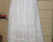 ilgas baltas sijonas