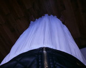 Ilgas klostuotas sijonas