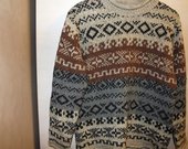 Kalėdinių raštų megztinis