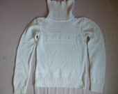baltas megztinis