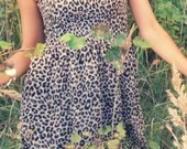 Leopardine suknelė.