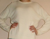 Baltas, laisvas megztinukas