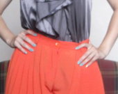 Oranžiniai asos sijono tipo šortai