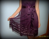 Nuostabi nereali purpurinė proginė suknelė