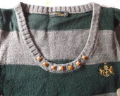 Terranova megztinis su kniedėmis