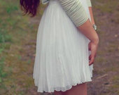 Klostuotas baltas sijonas 
