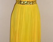 Geltona suknele