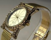 Stilingas moteriškas auksinis laikrodis