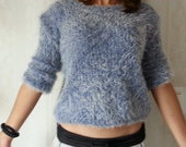 švelnus mėlynas megztinis