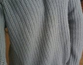 Jaukus pilkas megztinis