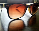 Stilingi akiniai nuo saulės