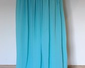 ilgas žalsvas sijonas