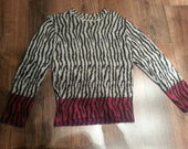 ,,TAIFUN" firmos megztinis