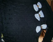 Silingas juodas megztinis