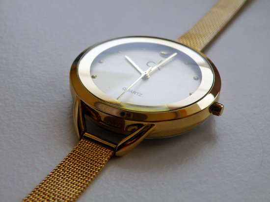Calvin Klein auksos spalvos laikrodis. 