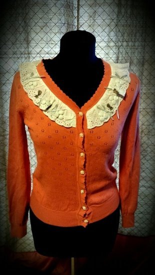 Oranzinis megztinukas dailus 