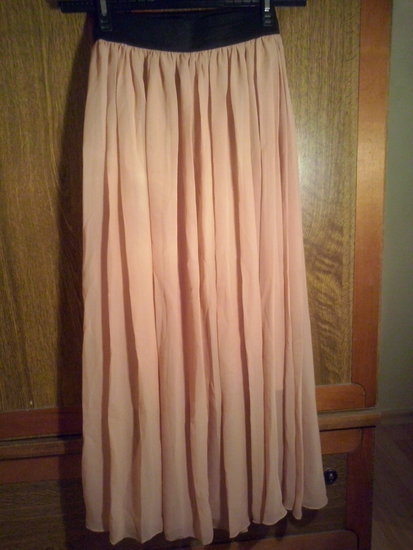 Ilgas, elegantiškas sijonas
