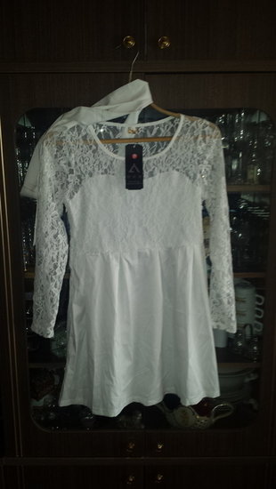 17.Balta nauja  suknele