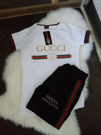Gucci kostiumas