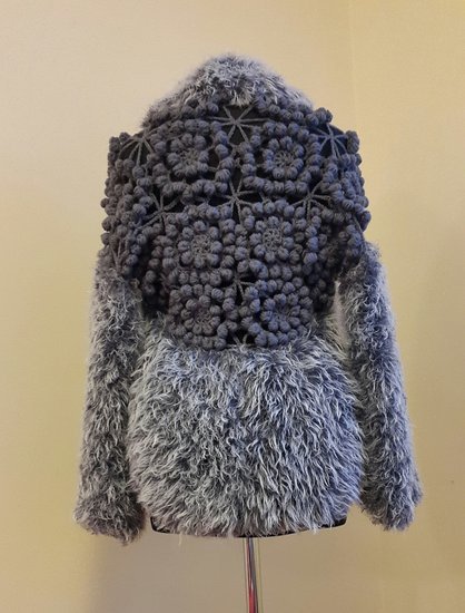 Įspūdingas megztinis su merinosų vilna
