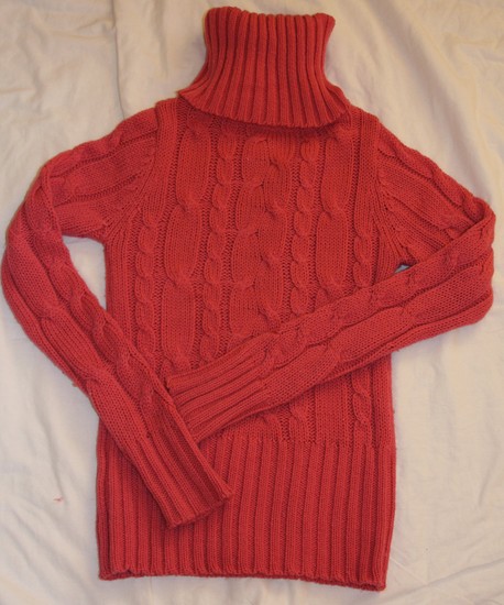 Rožinis megztas megztinis