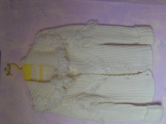 Siltas baltas megztinis