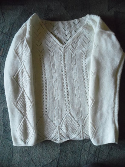Rankų darbo megztinis