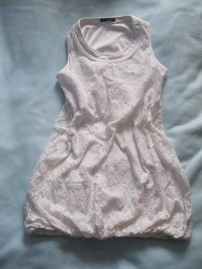 balta neriniuota suknele