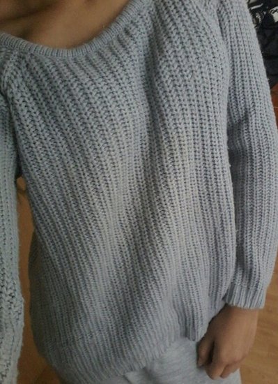 Jaukus pilkas megztinis
