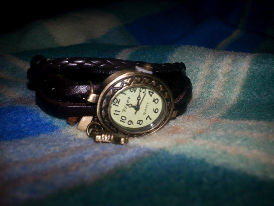 Stilingas vintažinis laikrodis