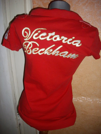 Victoria Becham raudona maikute 