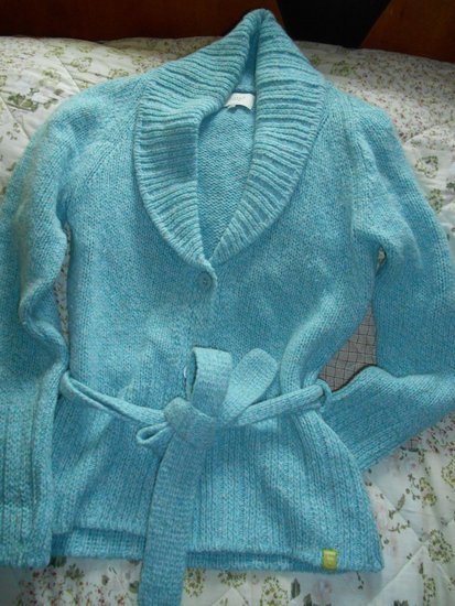 šiltas megztinis susagstomas