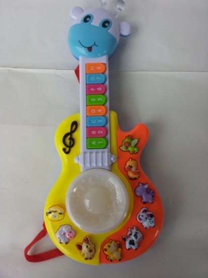 Plastikiniai muzikiniai žaislai:vežliukas, gitara